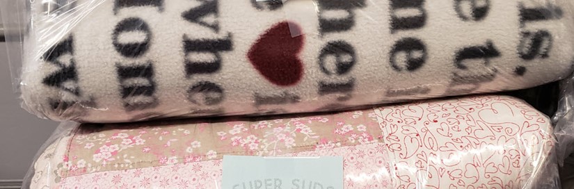 Closeup on blankets in laundry bag